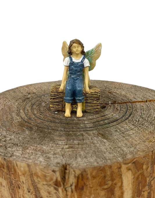 Fairy Sitting on Haystack