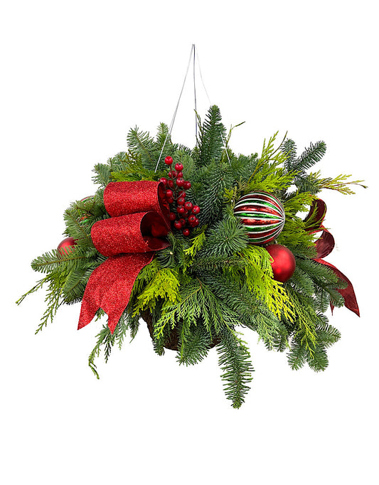 small winter basket with red bows and berries